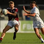 Galway's Cian Hernon secures possession ahead of Kildare's Eoin Bagnall of Kildare during the All-Ireland minor football quarter-final at Pearse Park on Saturday evening. Photos: Seb Daly/Sportsfile