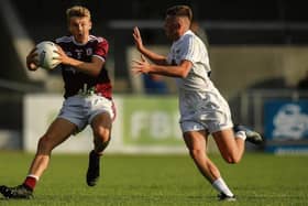 Galway's Cian Hernon secures possession ahead of Kildare's Eoin Bagnall of Kildare during the All-Ireland minor football quarter-final at Pearse Park on Saturday evening. Photos: Seb Daly/Sportsfile