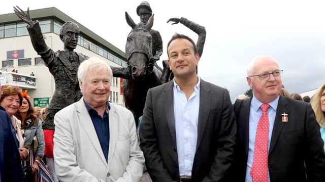 Artist John Behan, Peter Allen, Chairman of the Galway Race Committee and An Taoiseach Leo Varadkar, after he had unveiled a new sculpture, Leading In the Winner, to mark the 150th anniversary of the Galway Races. Photo: Iain McDonald.