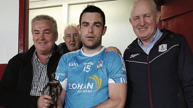 Kevin Burke of Kevin Burke Tyres, Athenry presenting the Man of the Match award to Sean McInerney of Oranmore/Maree. On right is Michael Larkin, Hurling Committee Chairman.