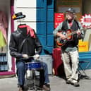 A busker on High Street in June 2010. . . the bye-laws restricting busking in city centre are a sad day for Galway and free speech (Photo: Joe Shaughnessy)