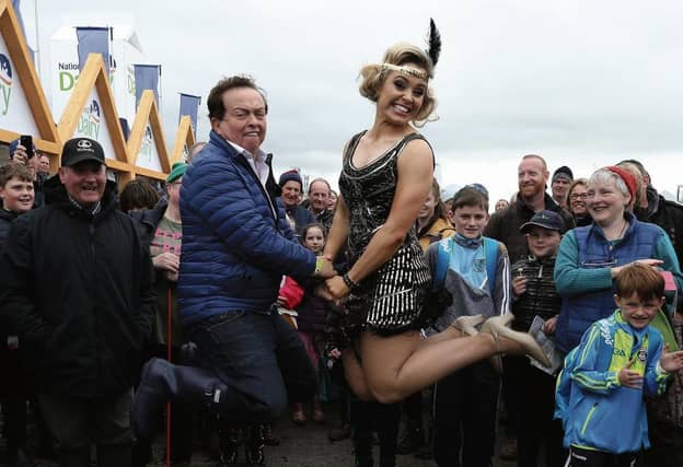 Former Cork camogie star, Anna Geary, flying high with RTE's Marty Morrissey at last year's Ploughing Championships.