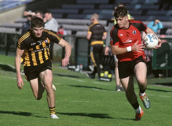 Mountbellew-Moylough’s John Daly gives chase to An Cheathru Rua’s Oisin O Griofa during Saturday's senior football championship tie at Pearse Stadium. Photos: Enda Noone.