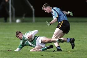 Moycullen's Daniel Cox secures possession ahead of Salthill/Knocknacarra's Harry Devlin, during the West Board Minor A football final in Loughgeorge on Tuesday evening. Photos: Joe O'Shaughnessy.
