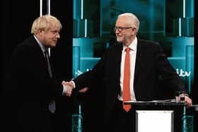Shake on it...Boris Johnson and Jeremy Corbyn before their election debate on ITV.
