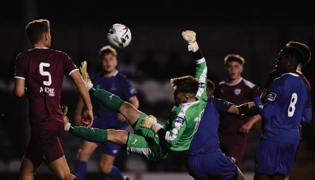 Galway United goalkeeper Sam O'Gorman does some acrobatics in trying to claim a cross during the Under 19 League final against Waterford FC at Eamonn Deacy Park on Monday night. Photo: Joe O'Shaughnessy.