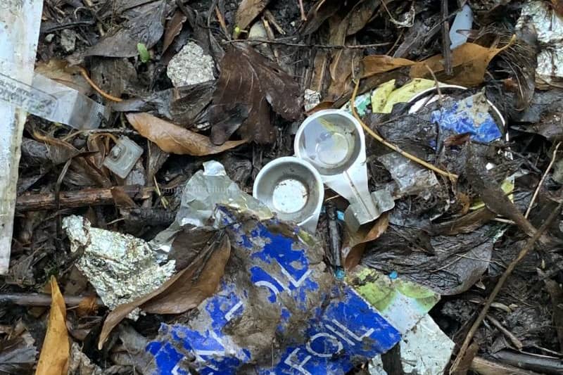 Disposable spoons, used syringes and tin foil beside The Plots.