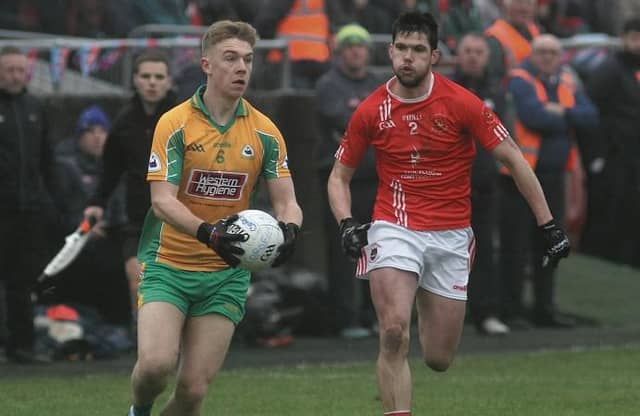 Corofin defender Dylan McHugh, in action against Padraig Pearses Shane Carty, will be key to the Galway champions' hopes of overcoming Nemo Rangers in Saturday's All-Ireland Club football semi-final in Ennis.