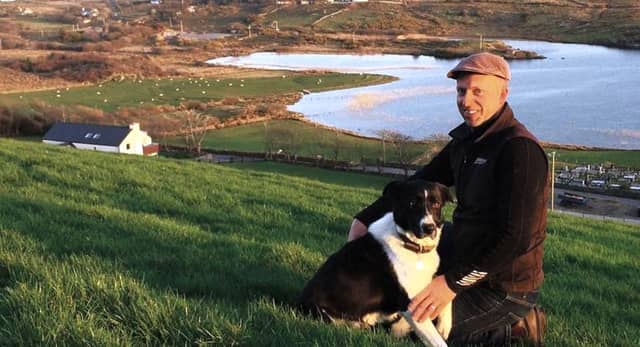 Tomás O’Toole with his sheepdog Roy on his farm in Moyard pictured against the stunningly beautiful backdrop of the Connemara landscape.
