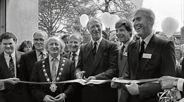 GIVE IT A LASH JACK
Former Irish soccer team manager, Jack Charlton, cuts the tape to officially open the brand new Eyre Square Centre on May 16, 1991. Player Mick McCarthy, who would later go on to manage the team, opened the Penneys store on the same day at the £26 million complex. Also photographed is Frank Casey, ICC; the then Mayor of Galway, Michael D Higgins; Jack Charlton; Brendan Murphy, ICC; and Seán Cannon of McInerneys.