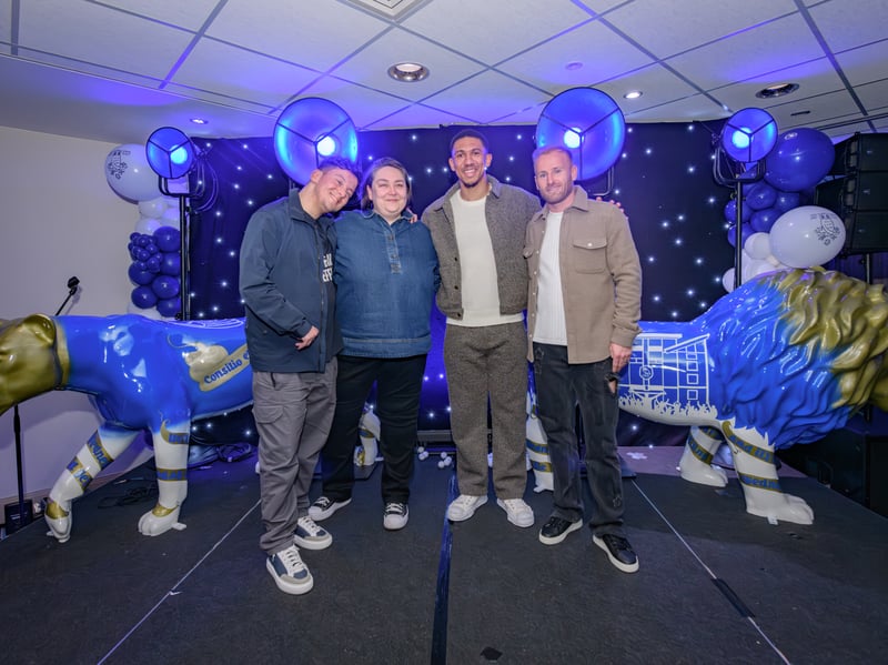 Max Burgar-Briggs, artist Zoe Burgar, Liam Palmer and Barry Bannan with the SWFC Pride of Yorkshire lions.