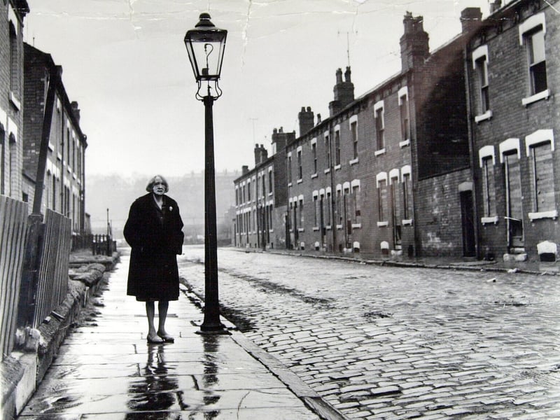 Ethel Kay, the street's last resident, stands on Cardigan Grove, Burley, Leeds, before it was demolished in 1970