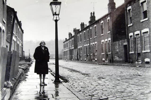 Ethel Kay, the street's last resident, stands on Cardigan Grove, Burley, Leeds, before it was demolished in 1970