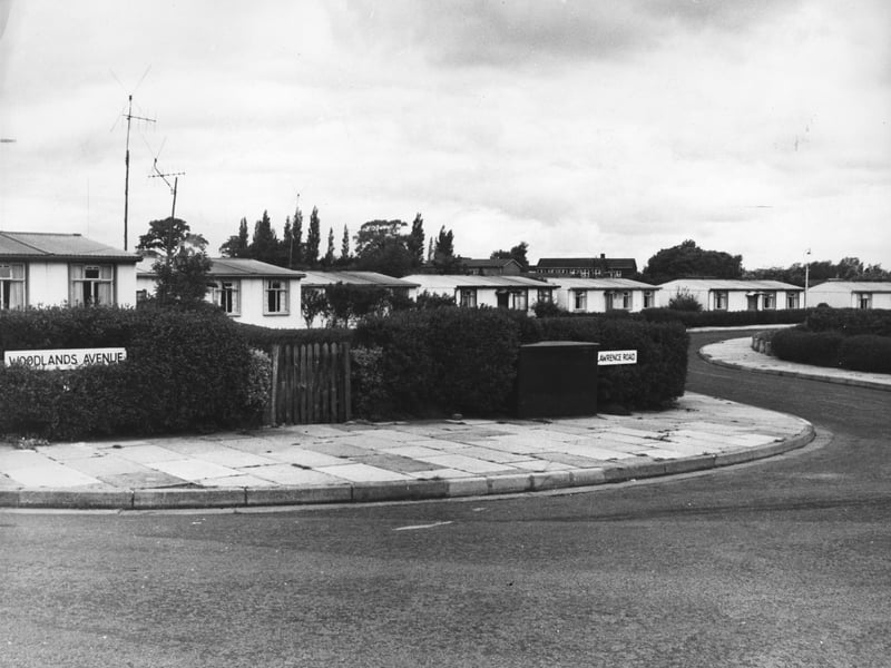 A glimpse of post-war housing in Wellington in June 1967, as prefabricated homes stood at the junction of Woodlands Avenue and Lawrence Road. Built as a practical solution to the need for more homes, these distinctive properties became part of everyday life for many families across the country. Do you remember living in a prefab, visiting friends and neighbours in one, or seeing these homes as part of the changing Wellington landscape?