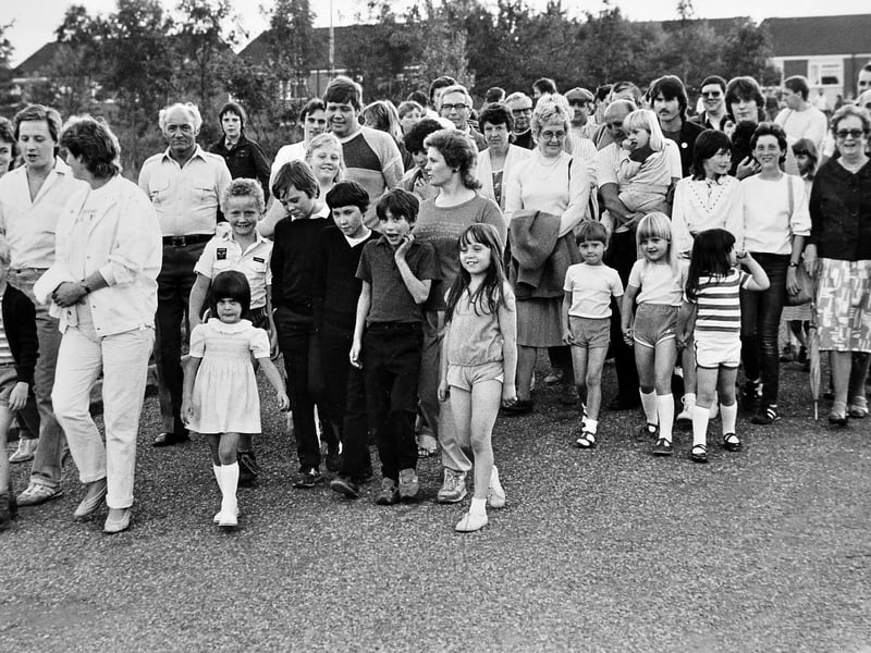 Local residents gather in force for a mass protest walk across Nedge Hill in Stirchley, Telford, on September 11, 1985. Community members turned out to oppose proposed plans for a Silicon Valley-style high-tech development on the green space. Before setting off, the crowd heard an opening address from David Morgan, vice-chairman of the preservation committee. Do you recognise anyone in the crowd or remember taking part in this local campaign back in 1985?