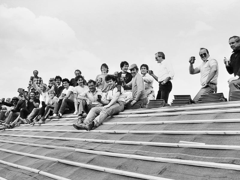 Contractors from Frank Galliers of Shrewsbury line the rooftop to raise a glass during a traditional topping-out ceremony in July 1985. A barrel of beer was hoisted to the top of the residential block in Ketley to mark the completion of the roof level for Wrekin Council's major housing facelift. The ambitious project saw the old flats in Brookhill Crescent converted into smart new two-storey homes and renamed Wedgewood Crescent. Do you recognise any of the hard-working builders celebrating high above Telford back in 1985?