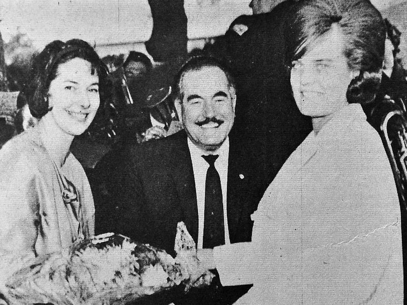 Actress Anne Cullen, who played Carol Grenville in The Archers, receives a bouquet from Miss Audco, Mrs Christine Davies, at the Royal Victoria Hotel in Newport on September 26, 1964. At centre is her real-life husband, actor Monte Crick, who played Dan Archer. Crick had been in Newport the previous weekend to open Audco Engineering Company's new playing ground at Audley Avenue and kick off a football match. How many Archers fans remember Carol Grenville and Dan Archer?