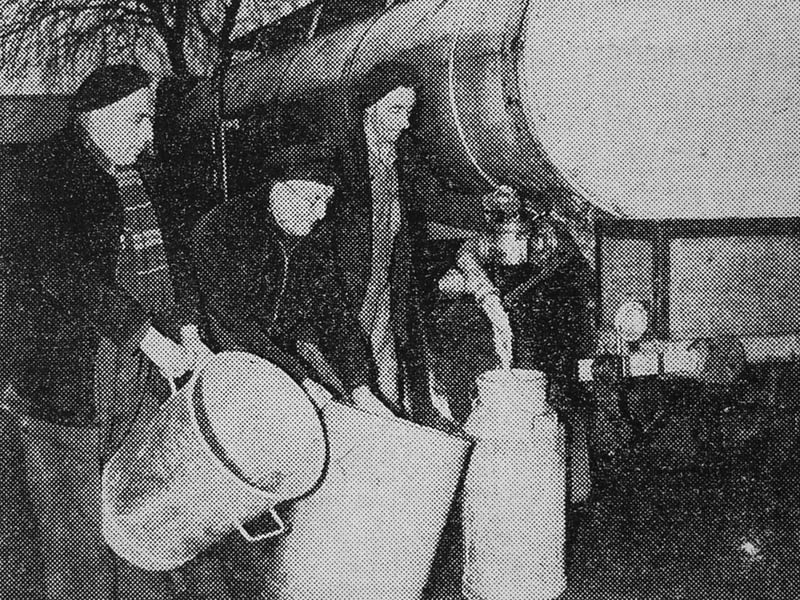 A milk tanker was pressed into service as a water cart at Newport Cottage Hospital just before Christmas in 1956. The hospital's supplies were being run into milk churns and dustbins after a broken borehole pump disrupted the water supply to Newport reservoir. Imagine having to collect water this way just days before Christmas. Do you remember this disruption, or hearing family stories about the water shortage?