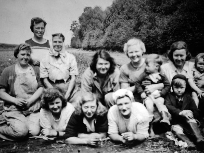Potato pickers take a break on a farm near Newport in the 1950s or early 1960s, with their children joining them for the day. Seasonal farm work was a familiar part of life for many local families, with children often accompanying their parents to the fields. Do you remember going potato picking, or being taken along to help your family with seasonal work?