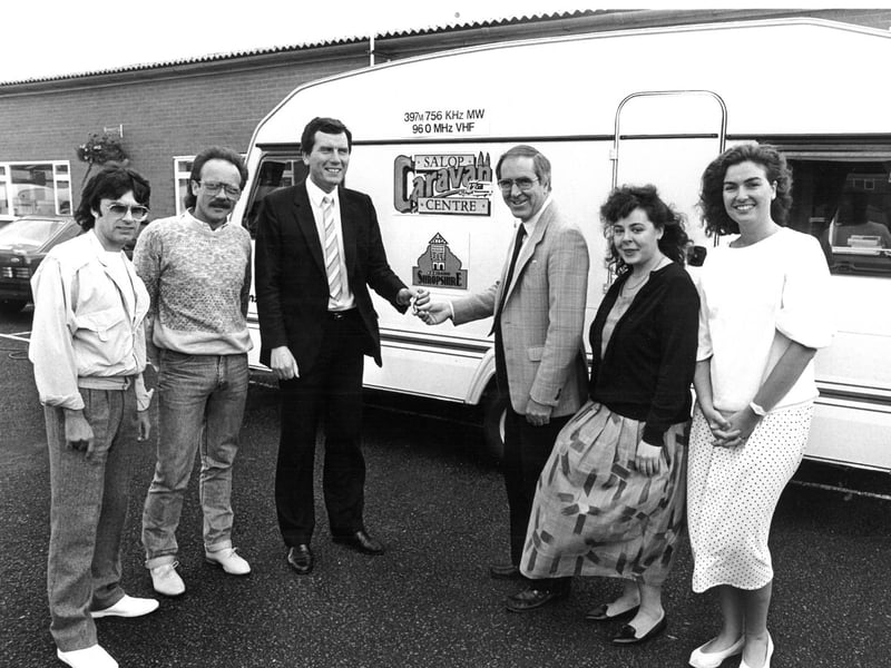 Tony Bywater hands over the keys to a mobile touring caravan to station manager Lawrie Bloomfield to help launch the brand-new BBC Radio Shropshire station in 1985. The caravan was set to tour the county to bring broadcasting right into local communities. Pictured from left are Adrian Jones, Harald Fuchs, Tony Bywater, Lawrie Bloomfield, Paula Al Lach, and Sheila McClennon. Do you remember spotting this mobile studio out and about around Shropshire back in 1985?