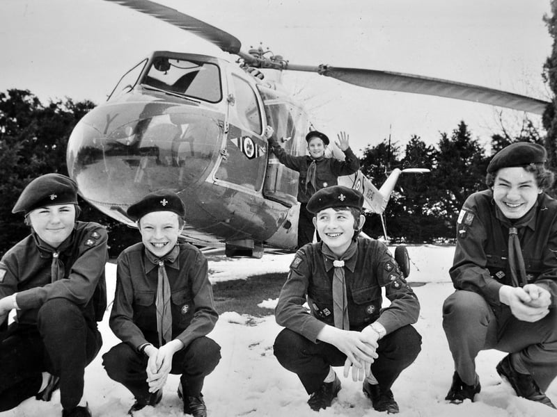 Members of the Church Aston Scouts enjoyed an exciting half-term trip to RAF Shawbury in February 1985. Pictured arriving at the base are, from left, Julian Steven, Ian Parker, Phillip Harris, and Ian Jones, while Richard Burton pauses behind them to inspect the impressive training helicopter stationed at the main gates. Do you recognise any of these young scouts who took off on a half-term adventure back in 1985?