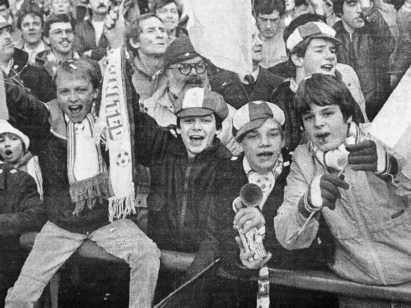 Passionate Telford United supporters cheer on their team at Goodison Park during a landmark FA Cup Fifth Round tie against giants Everton on Saturday, February 16, 1985. Though the non-league heroes eventually succumbed to a 3-0 defeat against the top-flight heavyweights, thousands made the memorable trip north to roar on their local side. Were you among the dedicated fans in the packed away end on that unforgettable afternoon in 1985?