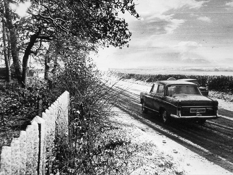 A brief snow shower transformed the countryside around Market Drayton into a winter scene on November 18, 1972. The snow soon disappeared in the autumn sunshine, but it offered a reminder of the colder days ahead. Do you remember unexpected snowfalls like this, or the winters of the 1970s?