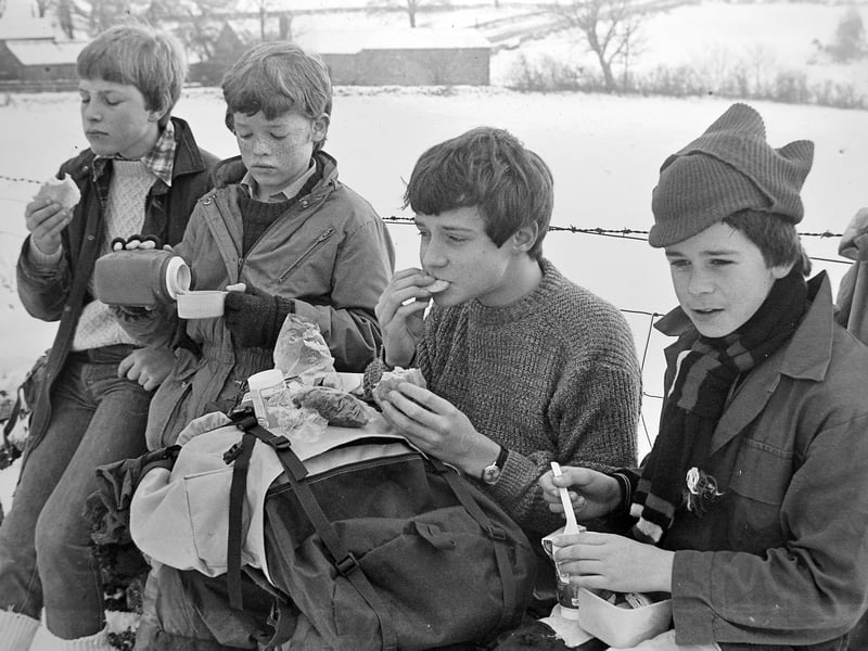 Members of the Oswestry Scout Group wrapped up warm for a brisk eight-mile cross-country trek on January 19, 1985. Taking a well-earned break in the snow at Carreg-y-big, intrepid hikers Chris Stewart, Ben Horner, Richard Barker, and Robert Jones tucked into hot drinks and sandwiches to recharge their batteries before heading back out on the trail. Do you recognise any of these brave young scouts who braved the cold back in 1985?