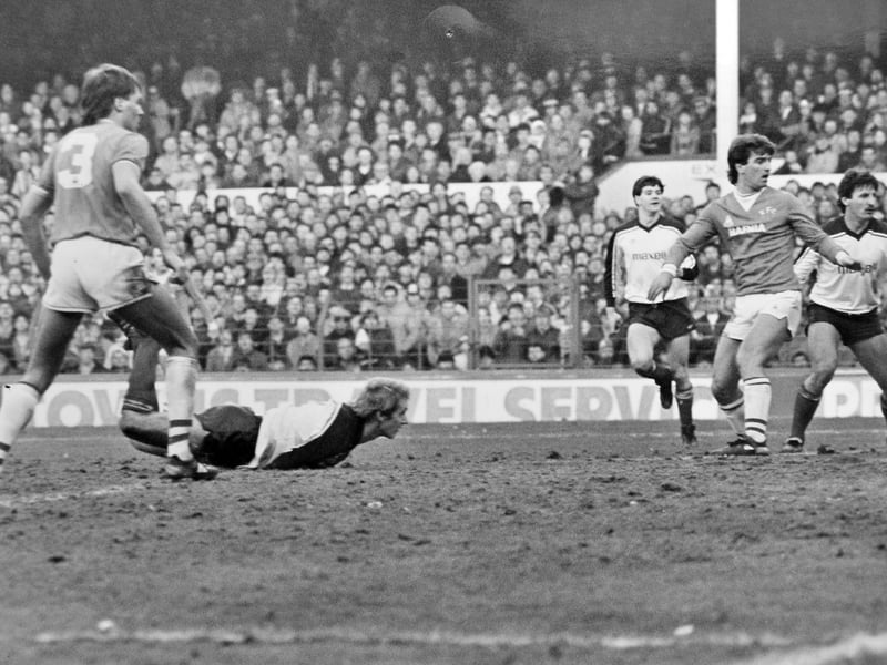 Telford United battle on the pitch during their historic FA Cup Fifth Round tie against First Division leaders Everton at Goodison Park on February 16, 1985.