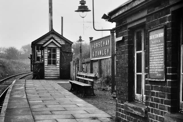 A quiet scene at Horsehay and Dawley railway station is captured on February 21, 1962, just before the station closed. With little sign of the bustle that once surrounded the railway, the photograph feels like a moment caught just before the end of an era. Can you remember travelling from this station? What do you remember about Horsehay and Dawley before the railway disappeared?