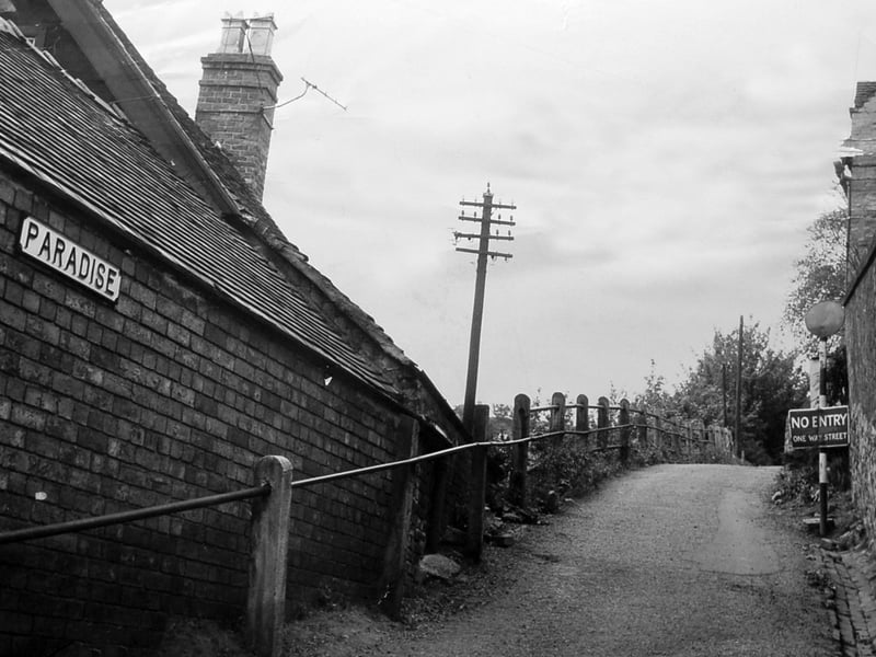 A steep climb up Paradise in Coalbrookdale is captured in this photograph from 1962. The winding road, lined with cottages, offers a glimpse of a corner of Shropshire that generations of local people would have known well. Looking at the scene today, how much do you think has changed? Do you remember walking or cycling up Paradise, or recognise any of the buildings?