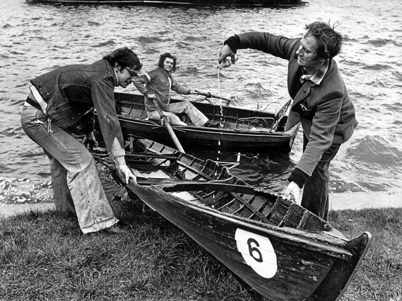 The skiffs were put back on Dartmouth Park pool in West Bromwich on March 24, 1975, marking the start of a new boating season. Head boatman Graham Brewster gives a cheerful "lemonade launching" as Keith Dixon and Stephen Hedges are already afloat on the choppy water. Do you remember hiring the skiffs at Dartmouth Park, and spending summer days out on the pool?