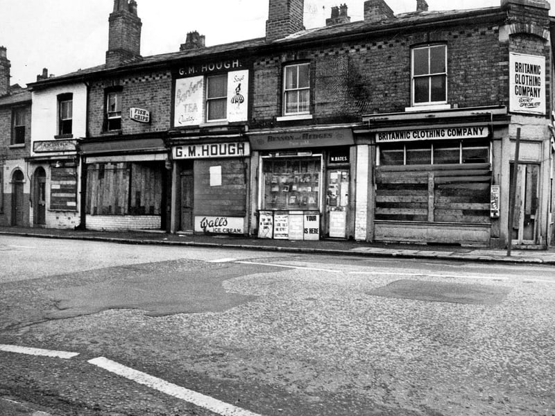 A group of derelict shops stood on Stafford Road in February 1975, opposite Ewins Street and between Moseley Street and the GWR works. The empty buildings give an impression of an area in transition, with demolition and redevelopment changing the streets around them. Can you remember these shops, or what this stretch of Stafford Road looked like before it changed?