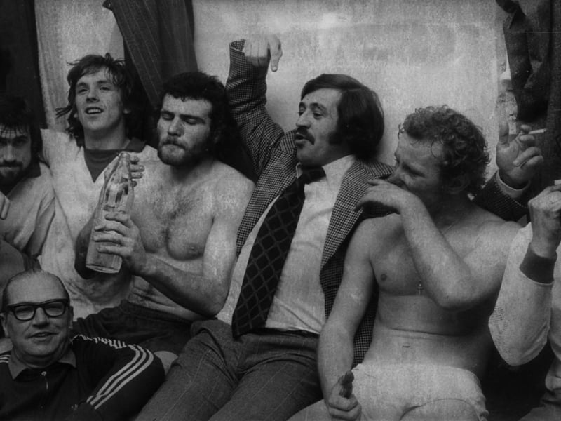 Walsall's acting manager Doug Fraser celebrates with the players, including goalscorers Bernie Wright and Alan Buckley, after one of the club's greatest FA Cup victories on January 8, 1975. The Saddlers beat Manchester United 3-2 in the third-round replay, played in front of the television cameras after a goalless draw at Old Trafford. It was a famous night for Walsall supporters. Do you remember watching the match, and where were you when the final whistle went?