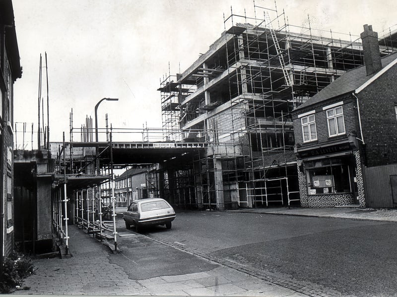 Construction of a new block of offices and shops at the junction of Oldbury Road and Birmingham Road, Blackheath, had been at a standstill for several months by May 1975. The original backers had run out of money, prompting councillors to call for Government support to get the project moving again. The unfinished development would have been a familiar sight to local residents passing through the area. Do you remember the building site, and what eventually happened to the project?