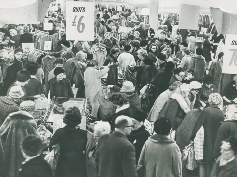 Bargain hunters pack the shop floor in their droves during the bustling January sales at the iconic Beatties store in Wolverhampton in 1969. Crowds sifted through rails of clothing as shoppers eagerly snapped up suits for as little as £6 each. While modern prices may have changed considerably, this bustling scene captures the sheer excitement of a classic New Year sale in the heart of the high street. Did you ever brave the January sale crowds at Beatties to bag a bargain?