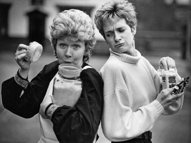 Eileen Kendrick, a guide at the Black Country Museum, opens a jar of traditional kali as assistant keeper Anne Lineeen enjoys some ordinary sweets in January 1989. The museum was preparing to open a 1920s-style confectioner's shop, offering visitors a taste of old-fashioned treats. Do you remember kali, or which sweets were your favourites as a child?