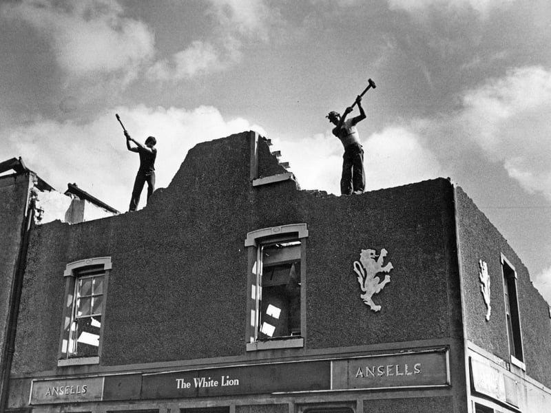 Demolition brothers Russell and Cliff Clarke were given the unenviable task of bringing down the White Lion in Green Lane, Walsall, in August 1980. The brothers, from Ladywood, Birmingham, worked for Wednesbury firm H E Humphries and could only carry out the demolition on Sundays, when traffic was quieter. Working high up on the nearly 200-year-old pub was certainly a job for the sober, despite the brothers enjoying a pint once the work was done. The demolition was eventually to be completed with the help of machinery. Do you remember the White Lion in Green Lane? What other Walsall buildings do you remember disappearing during the 1980s?