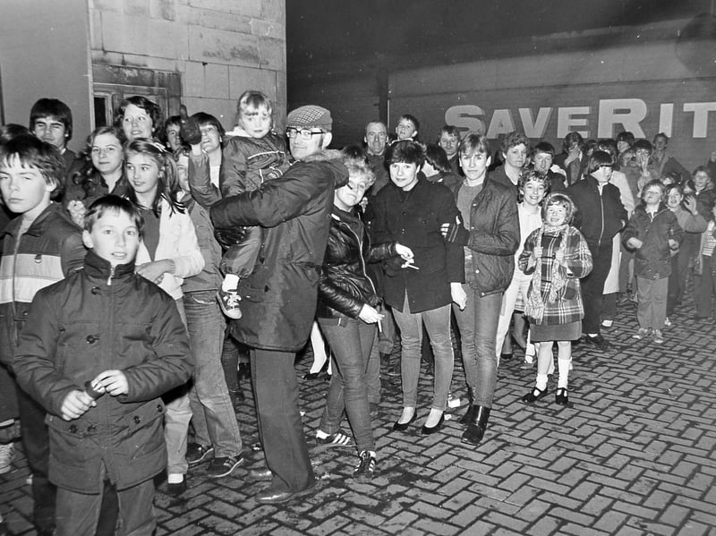 When ET landed in Wellington. Excited cinema-goers queue outside the Clifton on opening night in December 1982, with Saverite visible in the background. What was the first film you remember seeing there?
