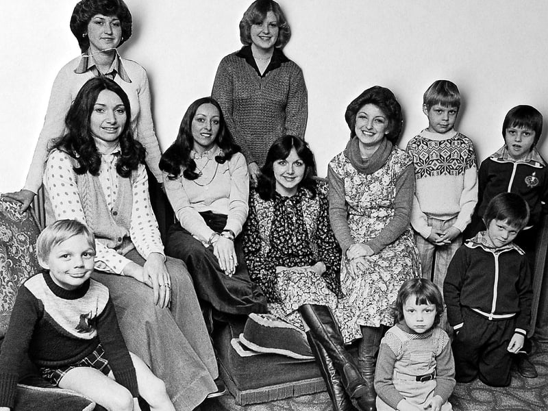 The wives and children of Shrewsbury Town gather in early March 1979 during the club's thrilling promotion-chasing campaign, with June Griffin and Rita Larkin standing behind seated Rita Mulhearn, Irene Lindsay, Ann Turner, and Linda Lochrie, joined by young Mark, Neil, and Samantha Turner alongside David and Colin Lindsay.  Do you recall seeing the players and their families out and about around Shrewsbury during that unforgettable season? How closely did you follow the Town's push for the Third Division championship back in the spring of 1979?