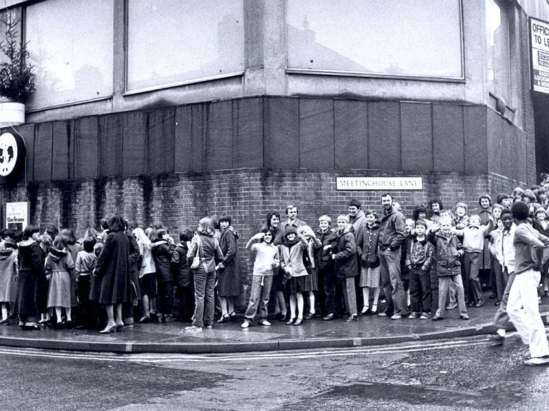 Queues for the Junior Star Christmas Party in December 1980 at Romeo's & Juliet's nightclub, on Bank Street, Sheffield