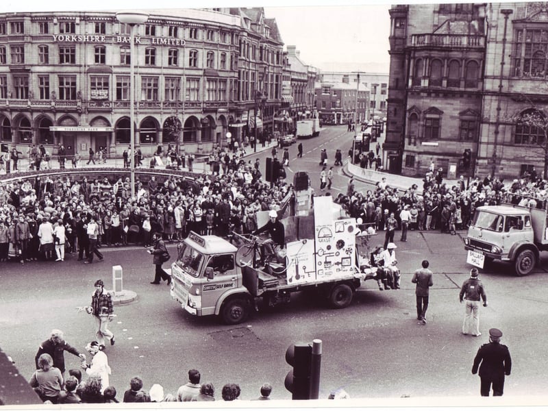 The student Rag Parade passes the Goodwin Fountain, at the top of Fargate, Sheffield city centre, in November 1980.