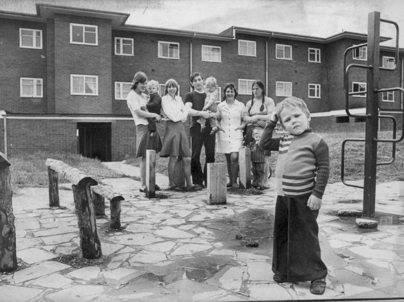A youngster scratches his head in utter bewilderment as parents and toddlers look on at a newly revamped play area on the Sledmere Estate in Dudley in 1976. Instead of traditional swings or slides, local youngsters were confronted by an abstract assortment of rustic wooden stumps, hitching-style posts, and metal climbing frames installed across two communal grounds. While designers intended the modern layout to encourage imaginative play, the quirky timber and metal obstacles left neighbourhood families scratching their heads over how exactly they were meant to be enjoyed. Did you grow up on the Sledmere Estate in Dudley or remember trying to make sense of these unusual play areas back in 1976?
