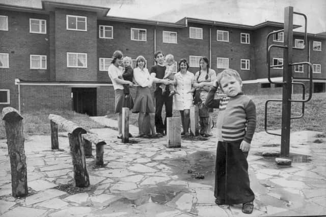 A youngster scratches his head in utter bewilderment as parents and toddlers look on at a newly revamped play area on the Sledmere Estate in Dudley in 1976. Instead of traditional swings or slides, local youngsters were confronted by an abstract assortment of rustic wooden stumps, hitching-style posts, and metal climbing frames installed across two communal grounds. While designers intended the modern layout to encourage imaginative play, the quirky timber and metal obstacles left neighbourhood families scratching their heads over how exactly they were meant to be enjoyed. Did you grow up on the Sledmere Estate in Dudley or remember trying to make sense of these unusual play areas back in 1976?