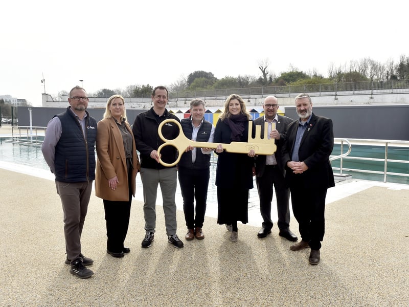 On Monday, March 23, 2026, Portsmouth City Council marked the completion of the multi-million-pound redevelopment of Hilsea Lido by officially handing the site over to its new operators.

Pictured is: (l-r) Gareth Walters, senior site manager for Beard Construction, Judit Kollat, General Manager Hilsea Lido, Harry Smith, Director, Sea Lanes, Duncan Anderson, CEO South Downs Leisure, Penny Mordaunt, Steve Pitt, leader of Portsmouth City Council and cllr. Lee Hunt.

Picture: Sarah Standing (230326-7470)


