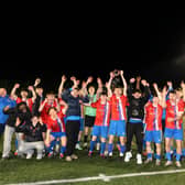 Knocknacarra FC celebrate after capturing the U-21 Premier Division title.