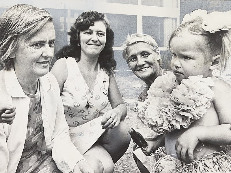 Phyllis Dudey, Diana Rout, and May Reeves (left to right) smile as they judge two-year-old Julia Fisher of Acacia Avenue in her pretty costume during an August 1976 fete and sports day in West Bromwich. For May—founder of the Rusty Wheel Club support group—and Phyllis, stepping out to judge the fancy dress parade and run a side stall organised by the Bermuda Mansions Tenants Association was a courageous milestone in confronting decades of severe agoraphobia. Did you attend the community fete on the Yew Tree Estate or remember the pioneering work of the Rusty Wheel Club during the summer of 1976?