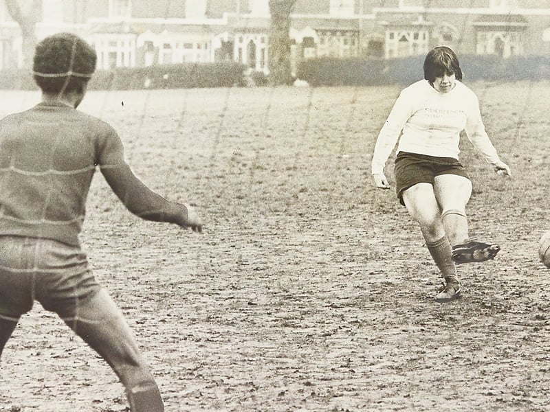 Fifteen-year-old goalgetter Brenda Viney tests the keeper with a sharp strike as she prepares for a local penalty shootout contest in November 1976. A pupil at Holly Lodge High School in Smethwick and a regular player with the Sportsco Ladies team, Brenda was the sole girl entrant stepping up against the boys in the district-wide competition open to all Sandwell schools. Staged at the Hadley playing fields on Waterloo Road, the contest served as a curtain-raiser to a charity football clash between BBC sports commentators and BRMB Radio in aid of Warley Cancer Research. Do you remember cheering on the teams at Hadley playing fields or taking part in school sports competitions during the autumn of 1976?