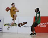 Titans captain takes to the air as Maree's Justin Wickham faces him down in last weekend's league semi-final in Oranmore.