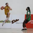 Titans captain takes to the air as Maree's Justin Wickham faces him down in last weekend's league semi-final in Oranmore.